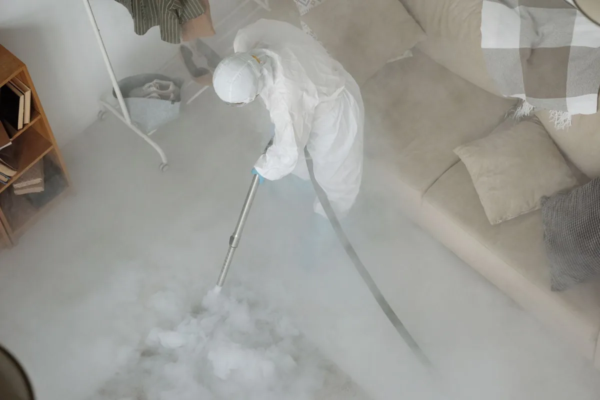 Biohazard cleanup technician in protective equipment, Montello, WI